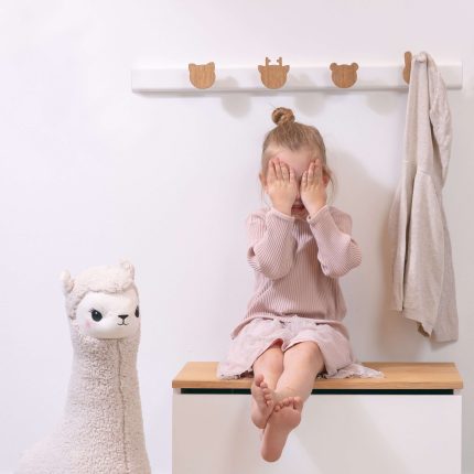 White wall hooks in animal forms for kids room