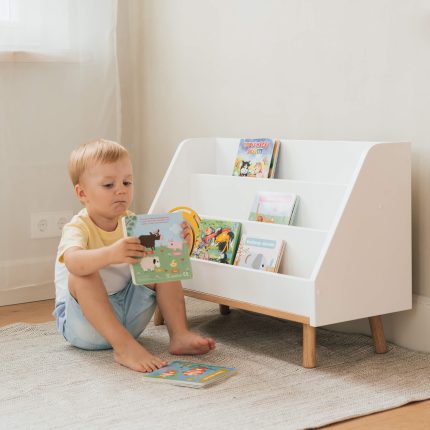 white wooden front facing kids book shelf